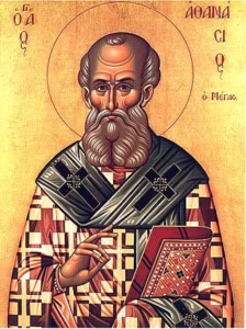 An icon of St. Athanasius holding a Gospel book and making the sign of the Cross his hand.