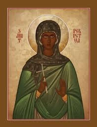 An icon of St. Perpetua holding a cross.